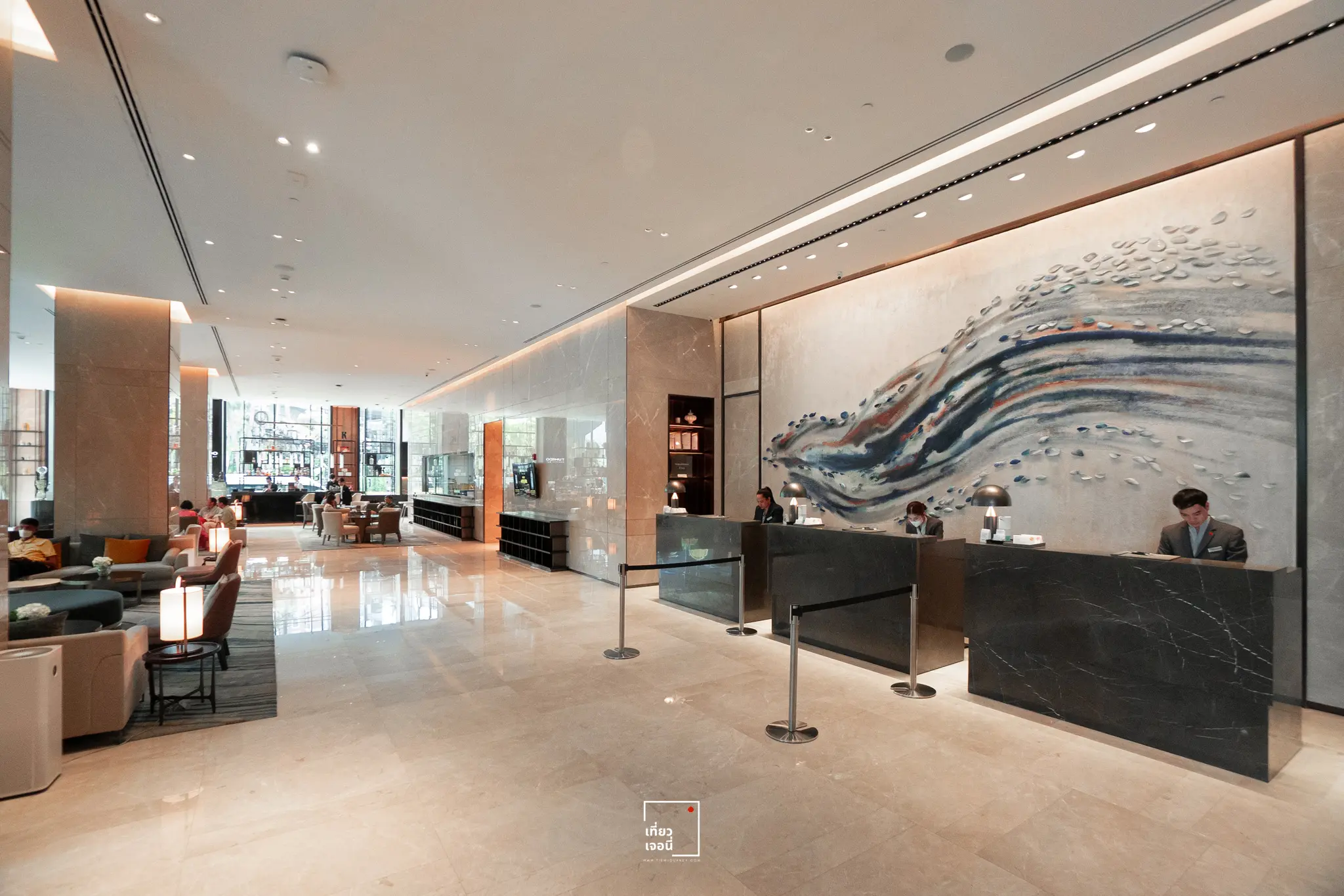 Modern Bangkok hotel lobby in Sukhumvit with a skyline view