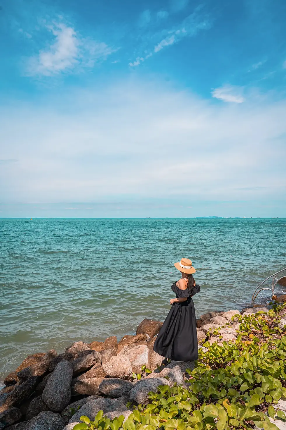 girl standing on the rock