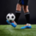 grass-soccer-player-foot-with-ball-training-game-action-practice-with-shoes-black-backgrou