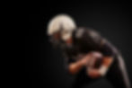 american-football-player-dark-uniform-with-ball-is-preparing-attack-black-wall_edited.jpg