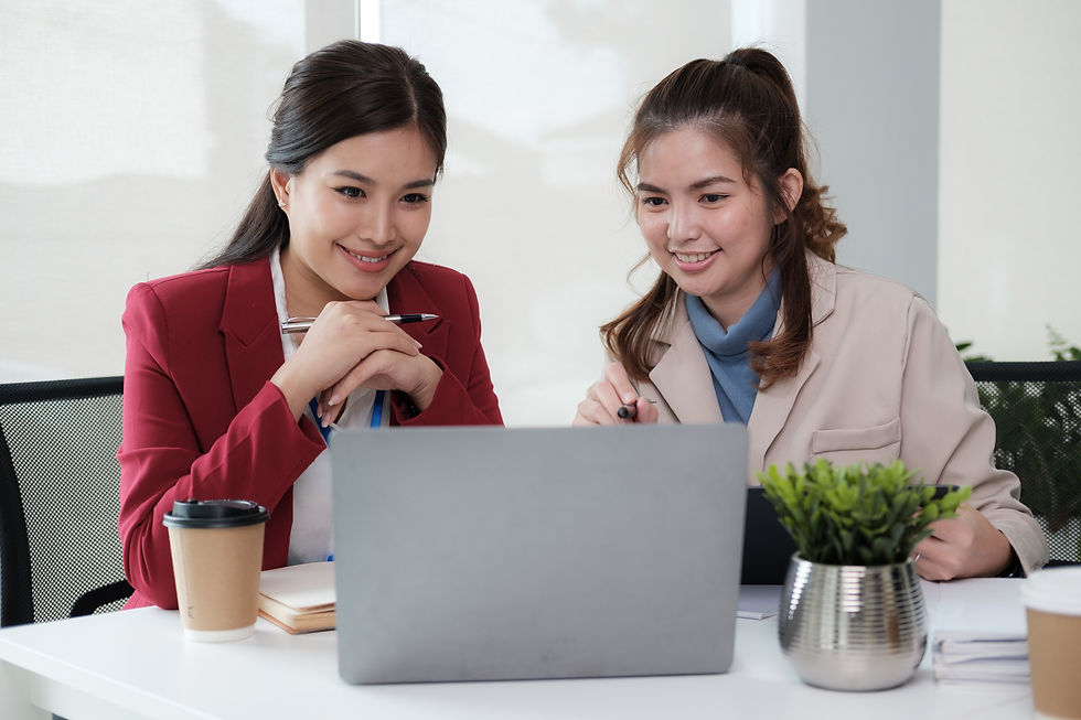 smart-business-people-working-together-with-laptop-while-talking-co-working-place.jpg