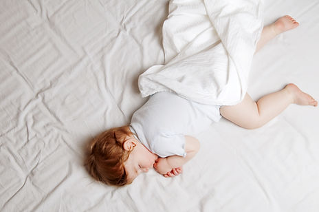 a baby or toddler sleeping