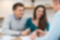 Young couple meeting financial advisor for investment_.jpg