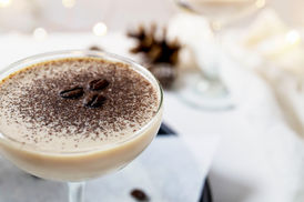 Creamy cocktail with coffee beans