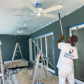 painting contractor painting a lanai ceiling 