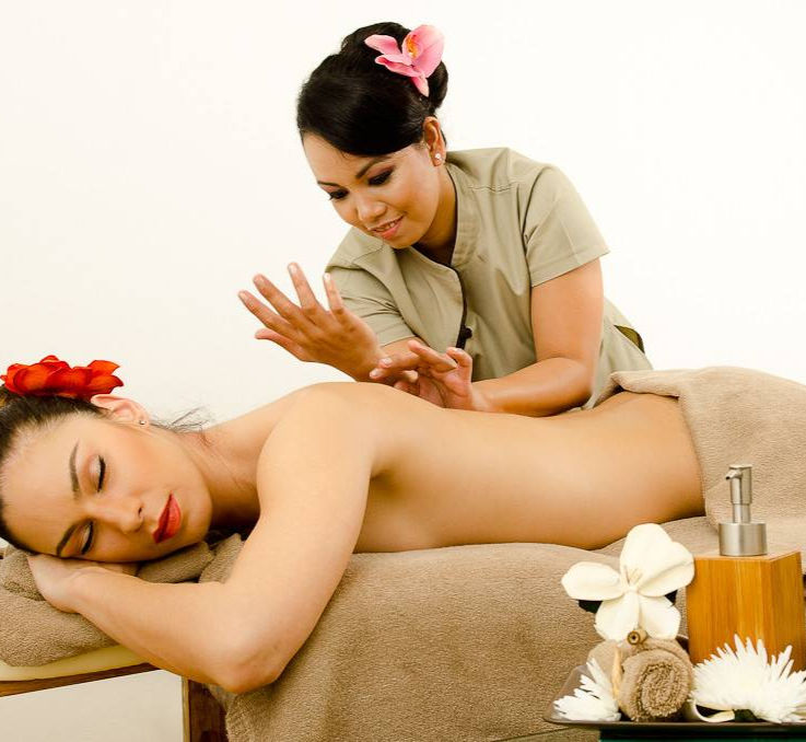 Eye-level view of a serene massage room with soft lighting