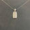 Thumbnail: Shiva Shell and Silver Rectangle Pendant