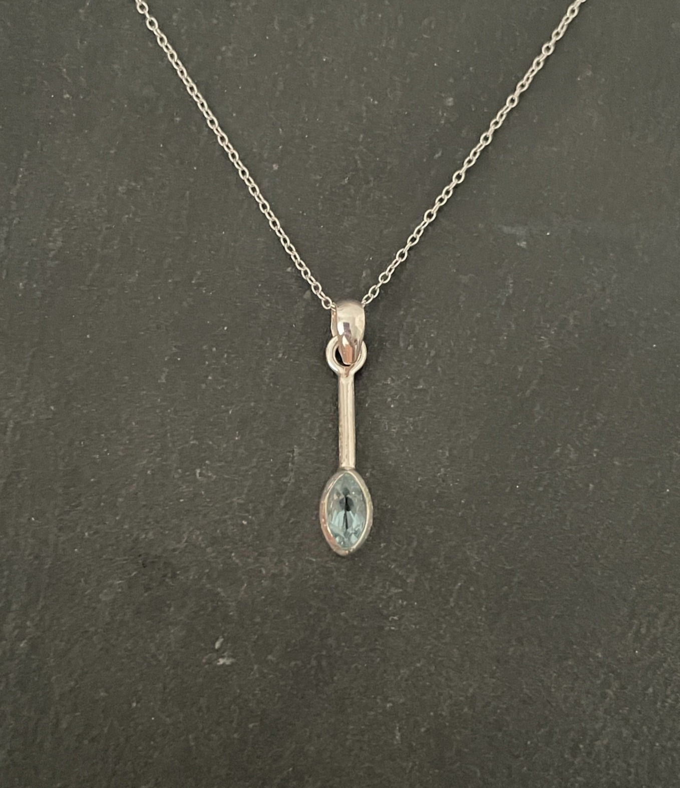 Blue Topaz and Silver Pendant