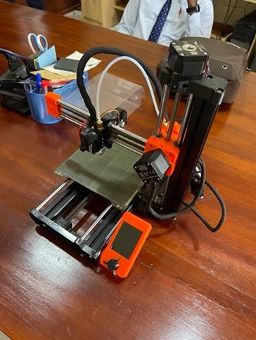 A Prusa MINI+ by Prusa Research, which retails for approximately $500 USD, purchased in the US and assembled in Uganda.