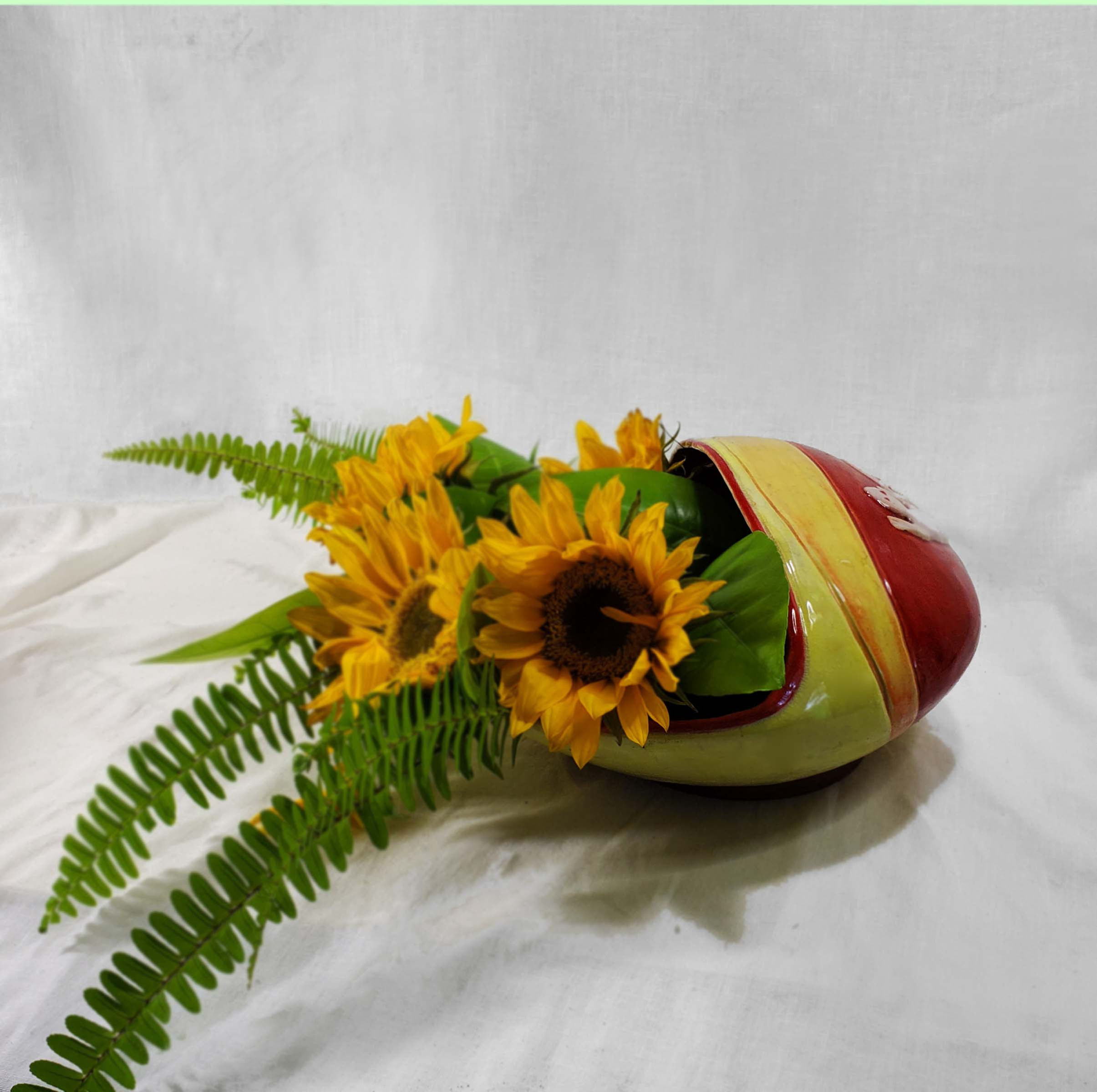 half covered oval low vase, red and yellow