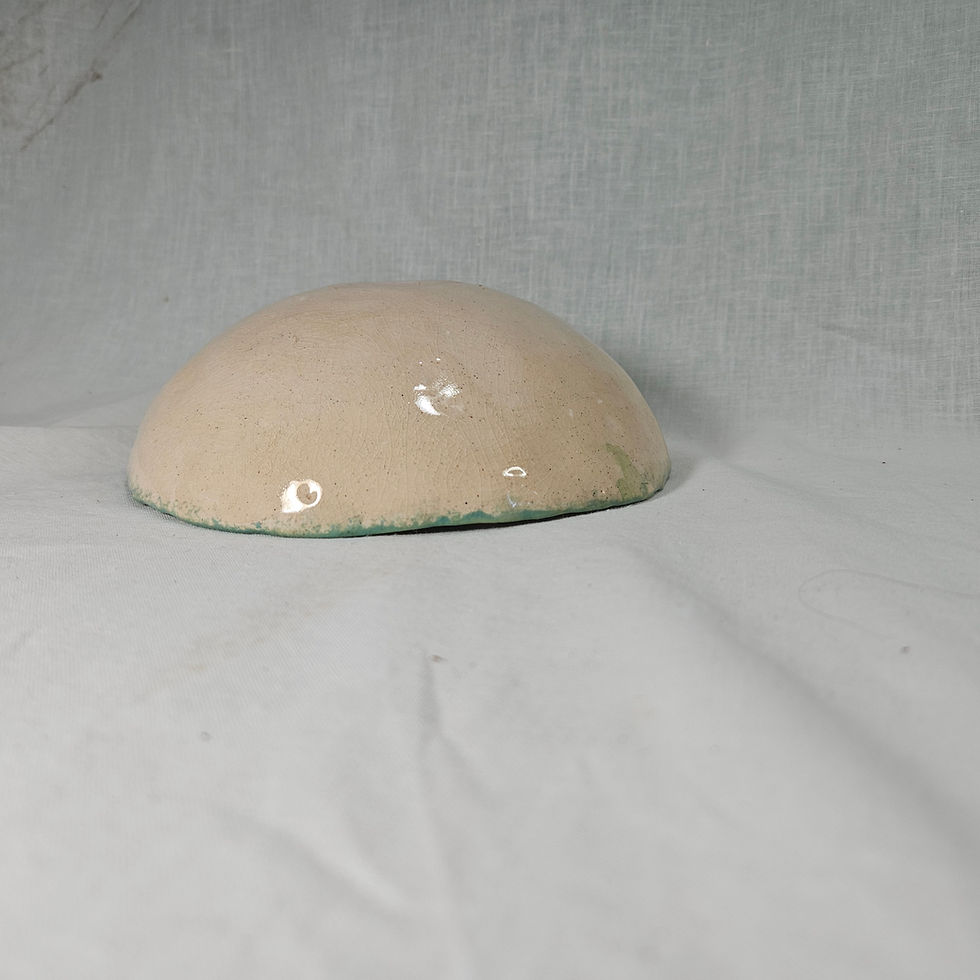 Thumbnail: profile of mossy green triskel embossed bowl