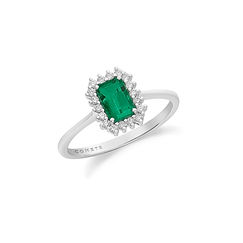 Anillo de oro 750‰, diamantes blancos y esmeralda octogonal Colección Joyas Regina Comete
