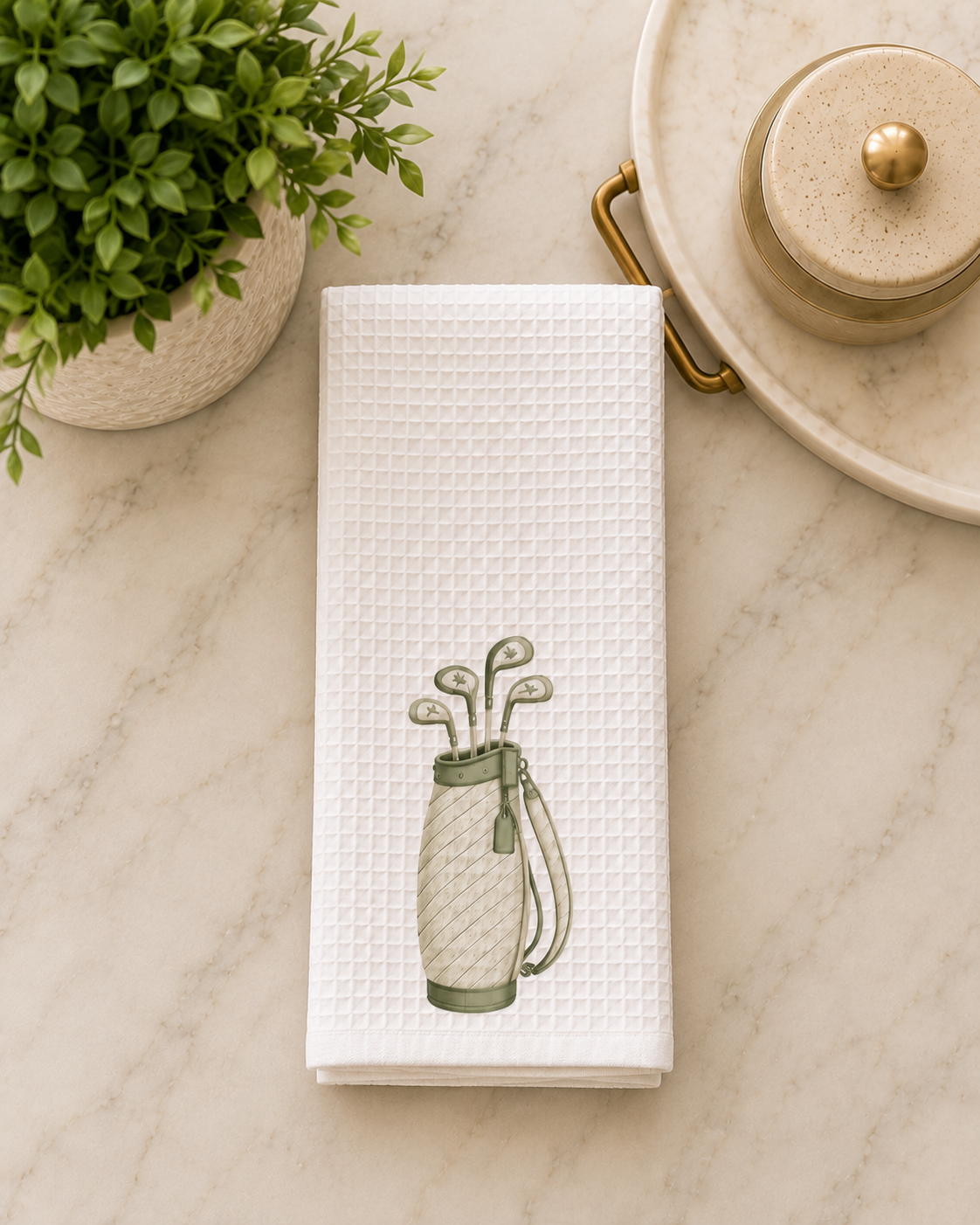 White waffle golf tea towel featuring an elegant ivory and sage green golf bag illustration