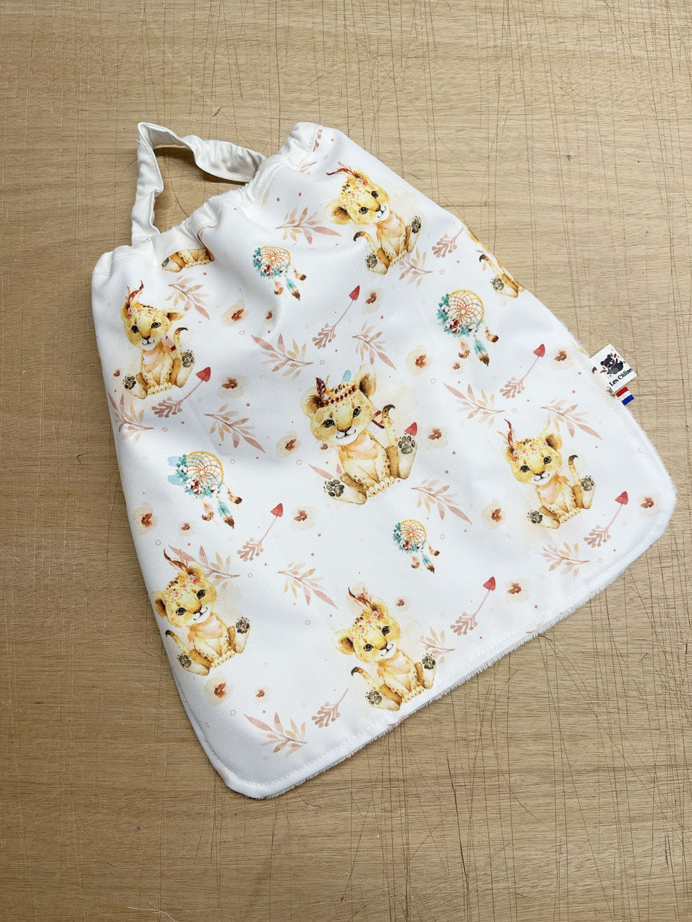 Bavoir élastique - Baby Lions