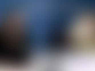 #OneOfTheTwo Lara Wong in a black FFP3 mask and black dress on the left. Dr Cathy Finnis in a white FFP3 mask and a navy blazer on the right. Clinically Vulnerable Families logo at the bottom