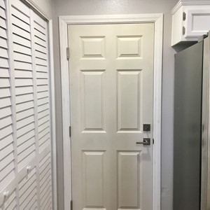 a new white door in a hallway 