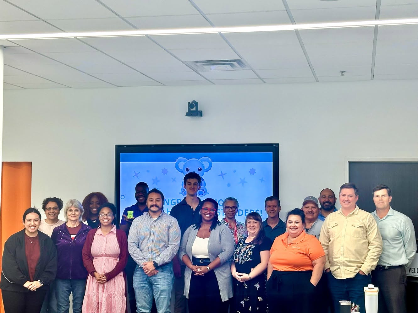 Participants celebrating the completion of Mental Health First Aid training with Velocity