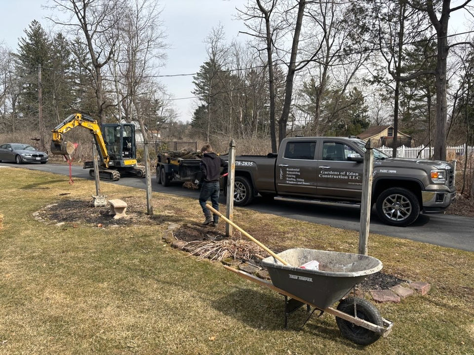 Landscaping crew working with machinery