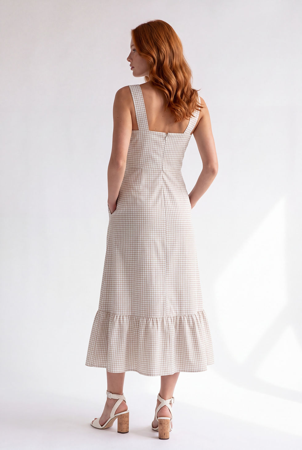 Beige gingham cotton midi dress with fitted waist and wide ruffled skirt, back view