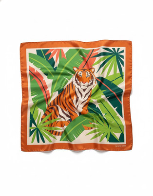 A multicolor satin scarf with a tiger surrounded by green jungle leaves.