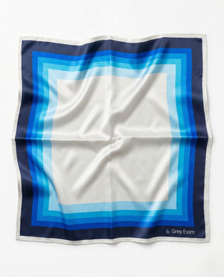 Flat lay blue and white geometric satin scarf