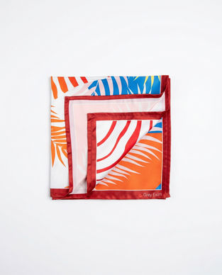 Woman wears zebra print scarf as head bandana