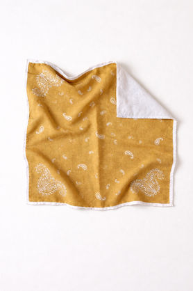 Mustard paisley square scarf folded to show pattern