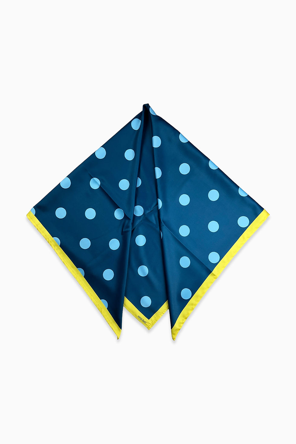 A navy blue polka dot scarf with a yellow border, folded into a triangle.