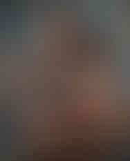 Woman styling floral printed scarf outdoors