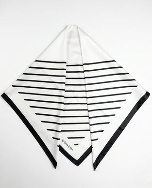 Black and white striped satin scarf folded in triangle shape