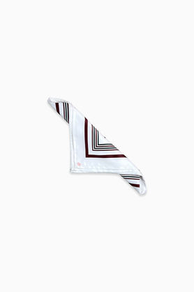 A white bandana with a geometric line print folded into a small triangle.