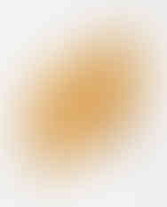 A square ochre paisley scarf floats in mid-air to show its pattern and white borders.