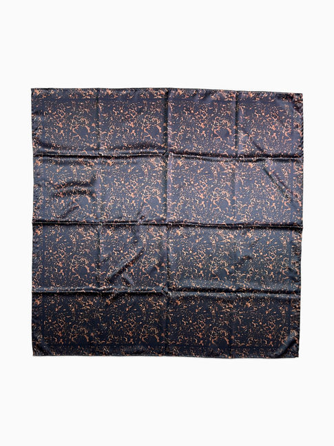 A square satin scarf with a dark, abstract copper and black animal print.