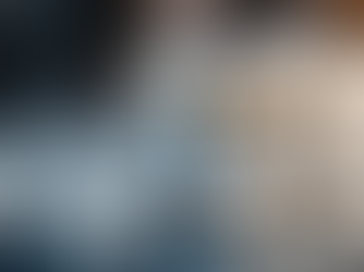 Three white bottles labeled "ED Lepulta Pequest 5800 Fentenus-Verthrus 2.3 mg Caplets" sit on a dark surface. Scattered around them are white pills. The background is blurred with a warm light.