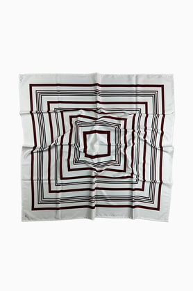 A white square scarf with a geometric pattern of burgundy and black concentric squares.