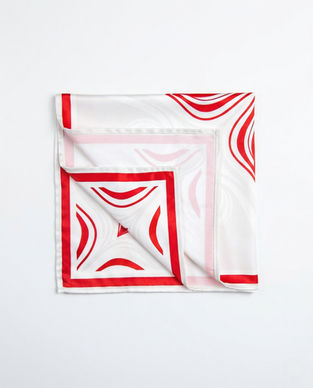 Folded red and white satin scarf corner detail
