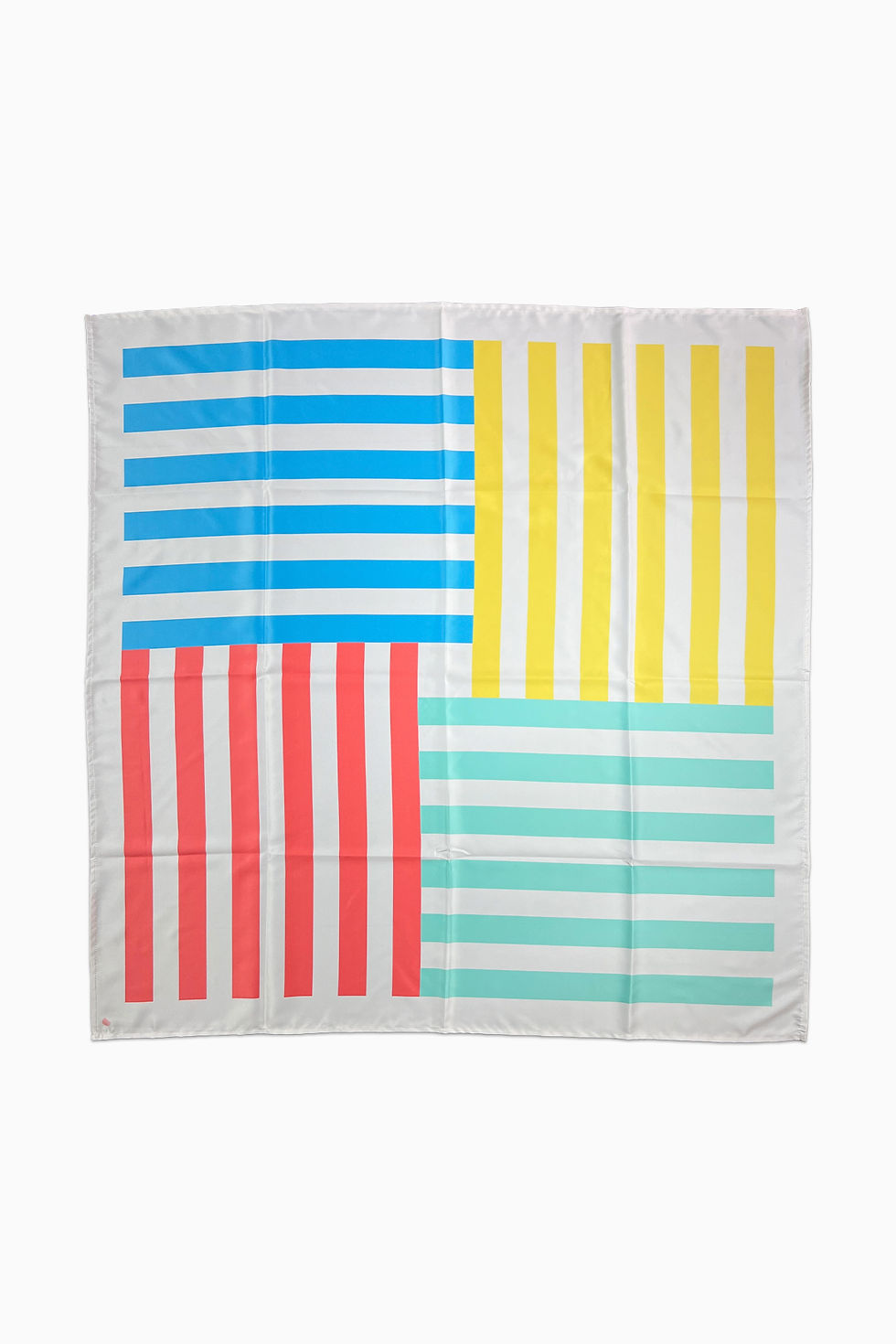 A white square scarf with a color block design of multicolored stripes.