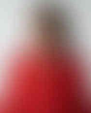 Woman wears zebra print scarf as neck wrap