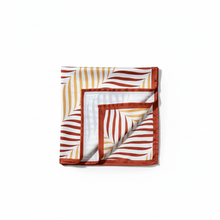 Close-up of folded satin bandana scarf showing detailed stripe pattern.