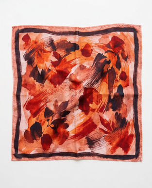 Burnt orange abstract square scarf with painterly brushstroke print and dark border, 50×50 cm.