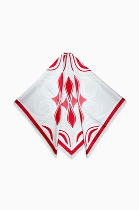 A white and red abstract print scarf folded into a triangle.