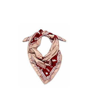 A beige satin scarf with a red Nordic winter border, arranged in a loose, knotted triangle style.