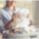 Elevated Lifestyle - Laundry Service Provider Folding Laundry