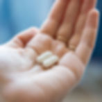 pills in hand