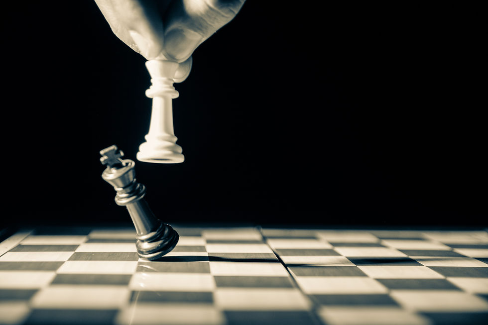Chess piece knocking an opponent's piece over. 