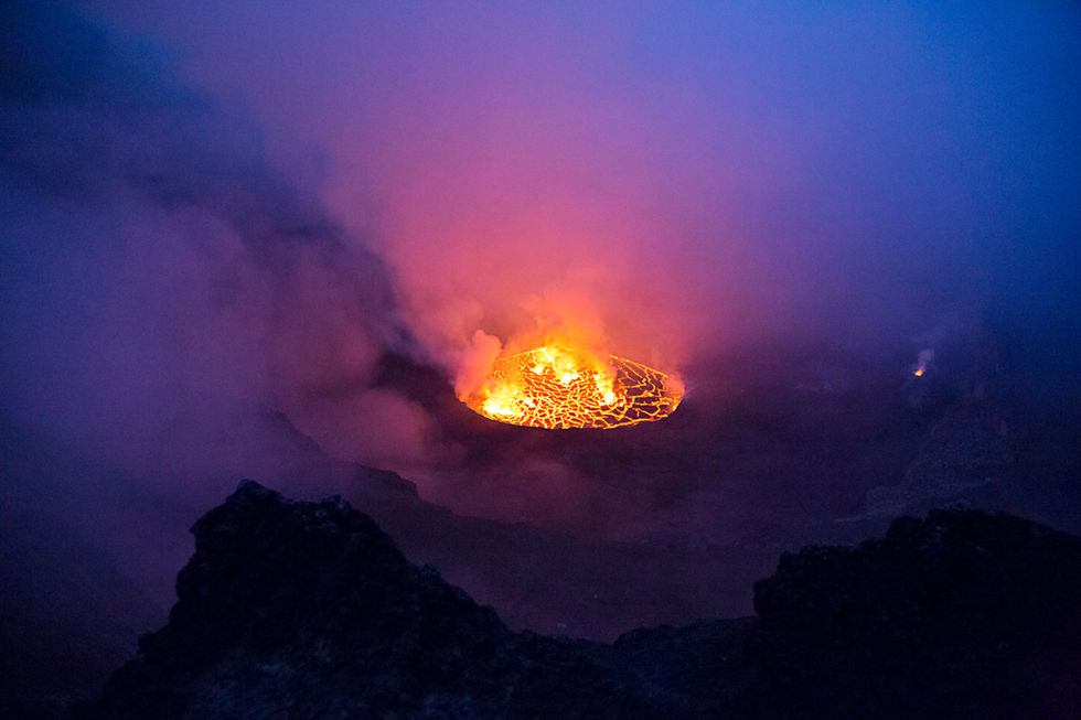The 300 meter-wide lava lake of Nyirangongo taken from the lip of the volcano. DR Congo.