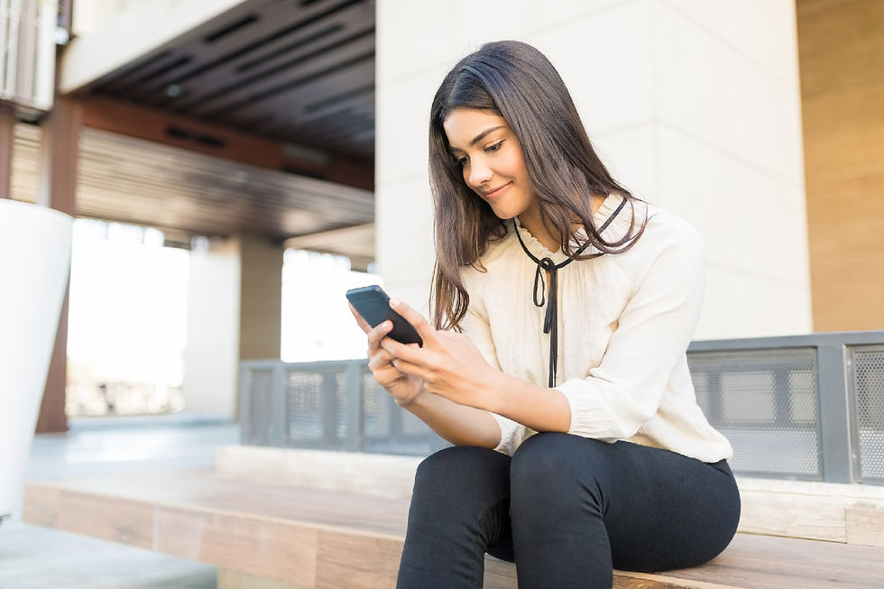 A girl sending a text message