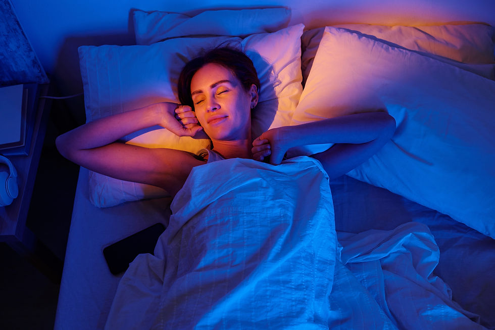 Woman sleeping in bed at night