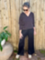 woman in v neck ribbed chocolate knit