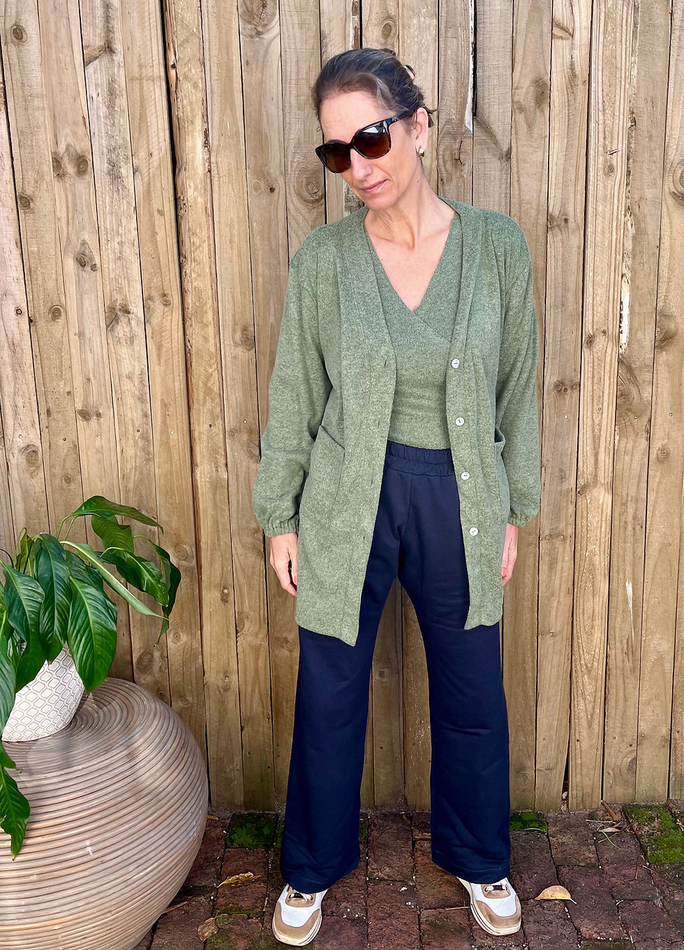woman in sage green cardigan